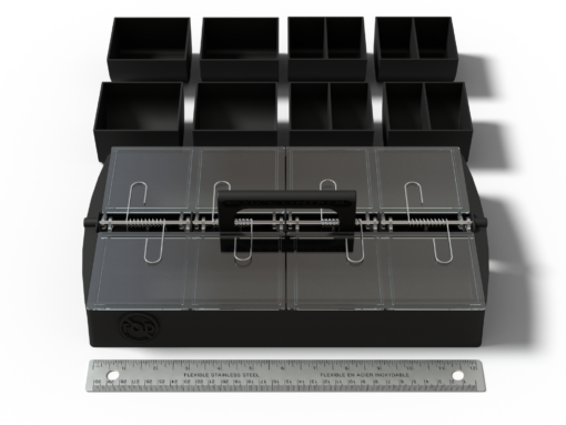 Compartment divider system facing front with removable bins, clear latching lid, handle, and 12-inch ruler.