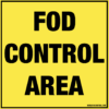 Yellow square FOD Control Area sign with black text, indicating designated debris management zone.