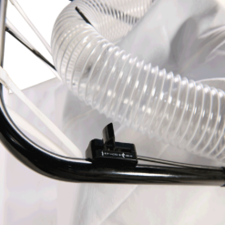 Close-up of FOD control walk behind vacuum sweeper handle, showing control lever, hose, and white filter bag.